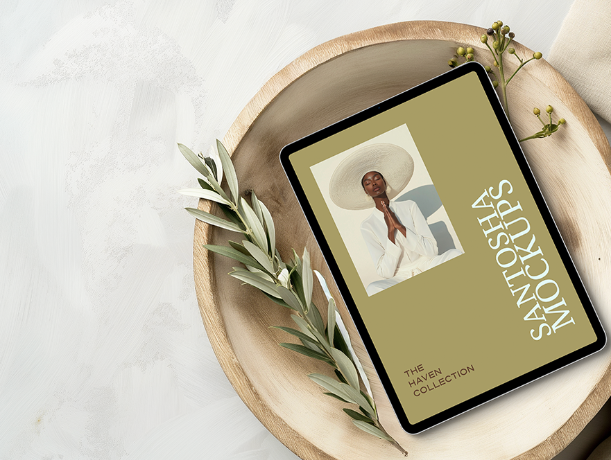 Studio Santosha HAVEN Collection iPad mockup displayed on a wooden tray, styled with olive branch and small berries in soft natural light.