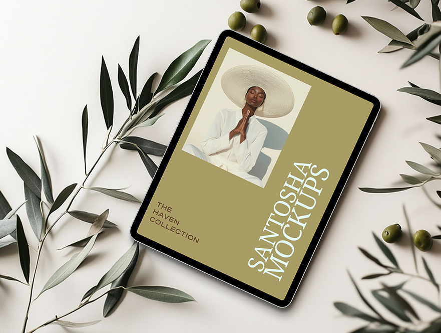 Studio Santosha HAVEN Collection iPad mockup featuring minimalist portrait design, styled with scattered olive branches and soft natural light.