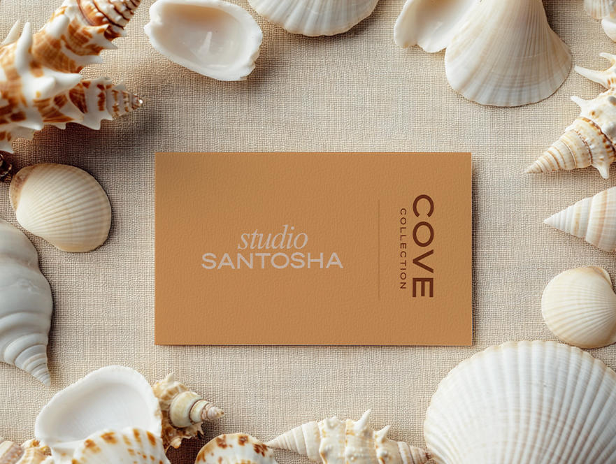 Business card mockup from the COVE Collection by Studio Santosha styled with warm coastal textures and soft natural light
