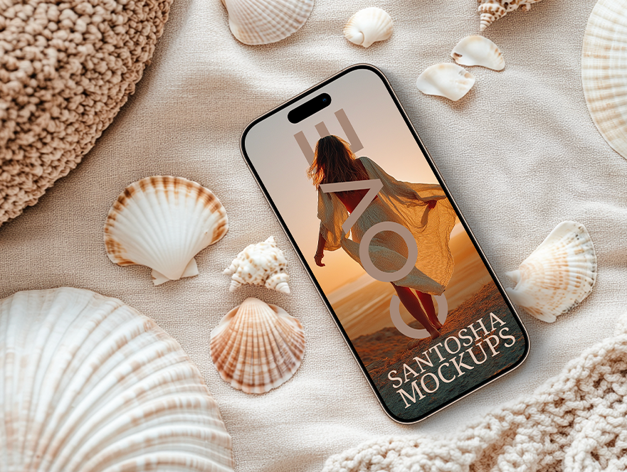 Smartphone mockup from Studio Santosha's Cove Collection, featuring a beach-themed design on a textured fabric surface with scattered seashells