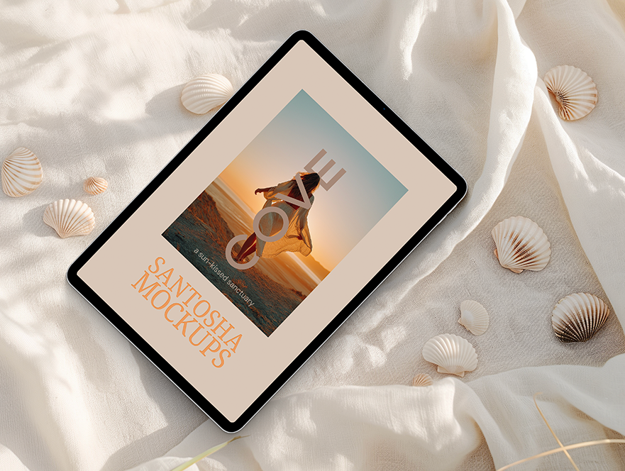 Cove Collection tablet mockup by Studio Santosha, displayed on soft white fabric with scattered seashells