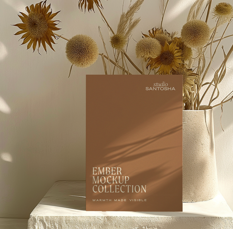 Studio Santosha Ember mockup card styled with dried florals in a ceramic vase and warm neutral light