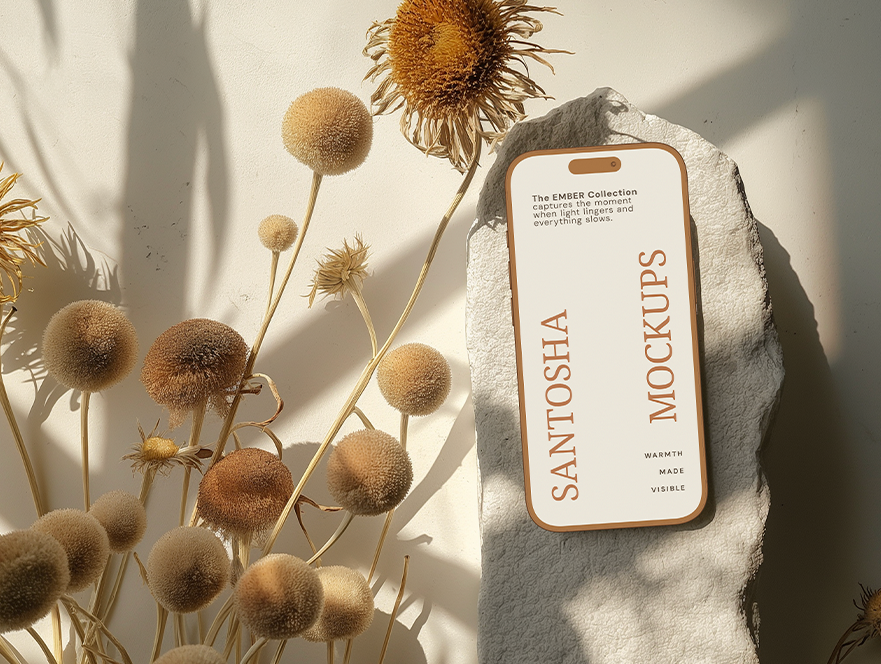 iPhone mockup with golden daisy styling and sunlight, from the EMBER Collection.