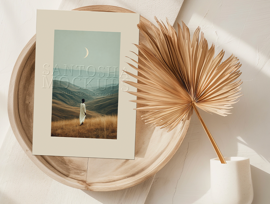 A4 card mockup from the SOHL Collection by Studio Santosha — vertical card displayed on a wooden tray with a dried palm leaf and ceramic vase, styled in warm natural light.