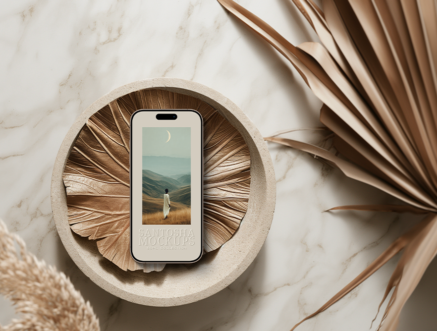 iPhone mockup from the SOHL Collection by Studio Santosha — styled on a round stone tray with dried palm leaves and marble background.