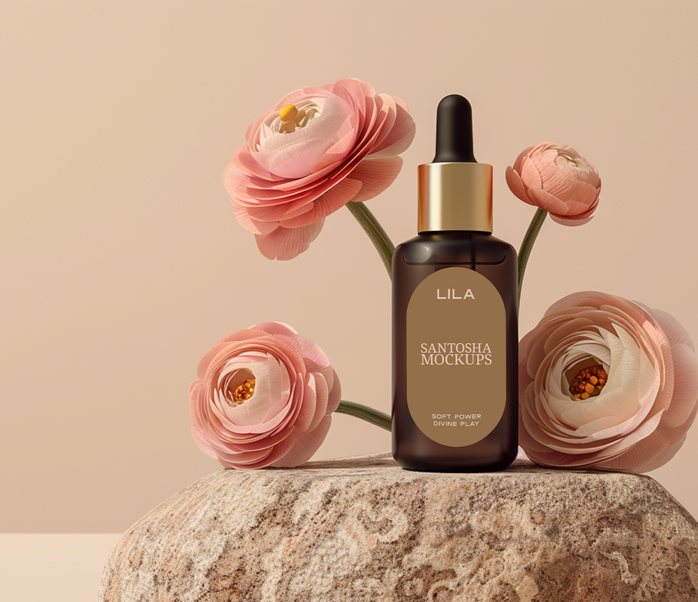Studio Santosha mockup from the LILA Collection, showcasing an amber beauty bottle with a gold cap, styled on a stone surface surrounded by soft pink ranunculus flowers against a warm beige background.